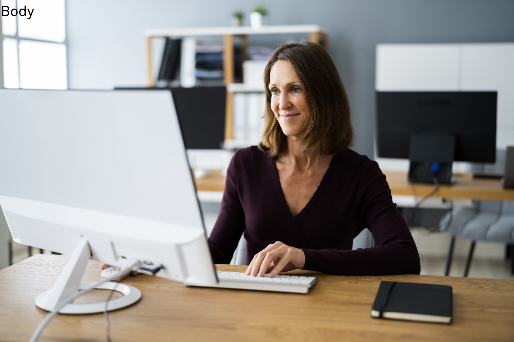 Person Smiling at computer