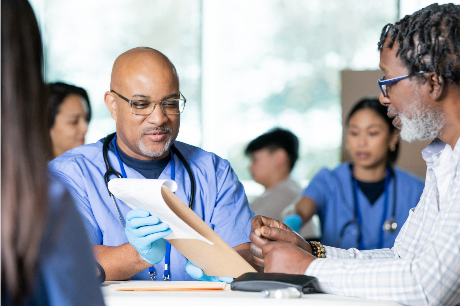 Clinician and Patient reviewing results of health screening