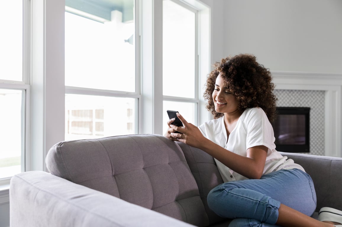 woman happy on phone