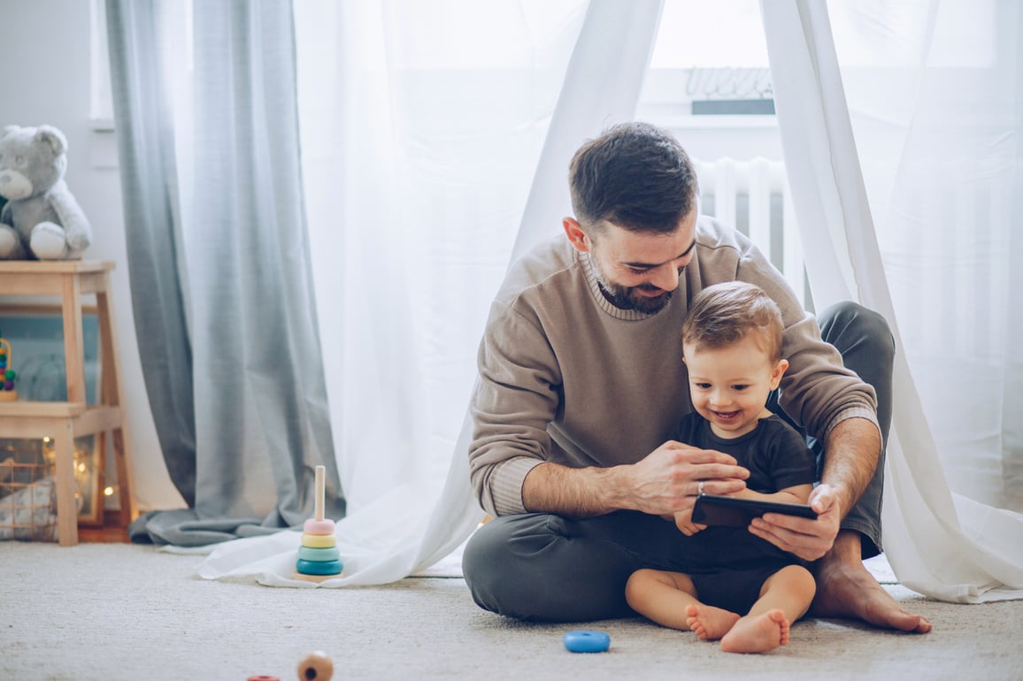 Father and son on phone