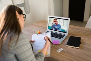 Patient and therapist during virtual care appointment for mental health